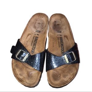 Birkenstock size 38  with a whole punch